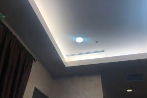 modern dropped ceiling installed in bedroom with downlights